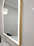 Side Angle of Gold-Framed Arch-Shaped InVogue Mirror