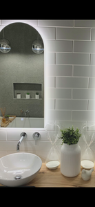 Close-up View from Center Vanity Space to Left LED Mirror