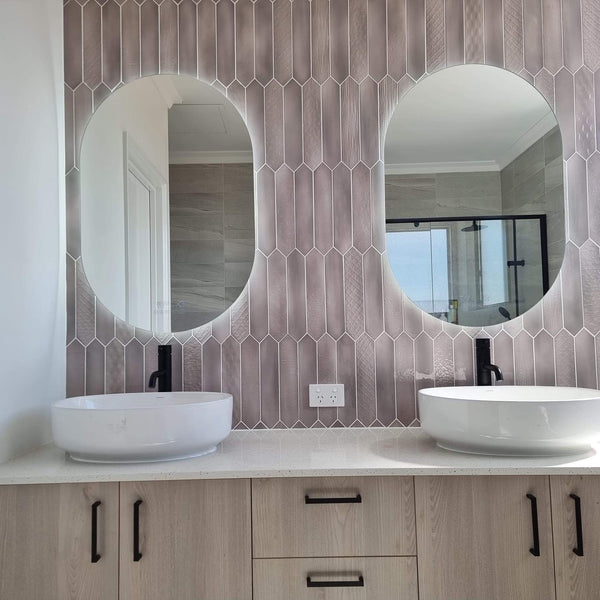 Patterned Washroom Wall with Dual Oval and Pill-shaped Digital Mirrors