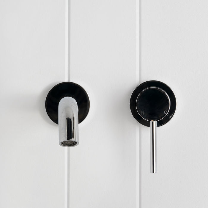 Milano Wall Spout Plus Wall Mixer in Chrome, front view of polished spout and lever mixer on white vertical-panelled wall