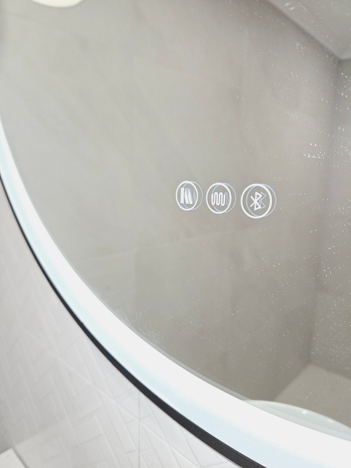 Close-up Shot of Circle Black Frame Smart LED Mirror with Three-Touch Control Buttons Display
