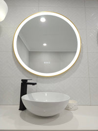 Low Angle View of InVogue Circle-Shaped Smart LED Mirror atop Sink
