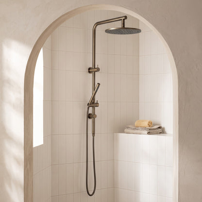 Corsica Dual Shower Head in Antique Brass in a shower