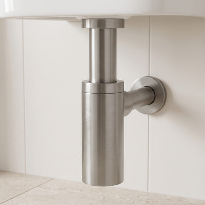 Firenze Basin Bottle Trap in Brushed Nickel in a bathroom