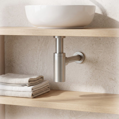 Firenze Basin Bottle Trap in Brushed Nickel in a bathroom