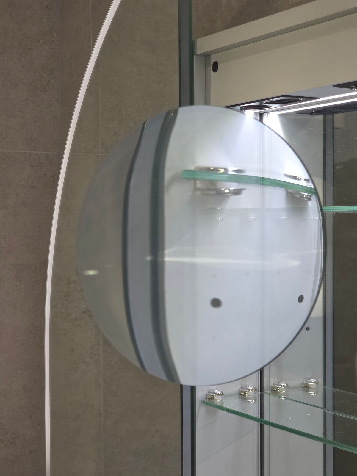 Inside view of frameless LED mirror cabinet with internal magnifier