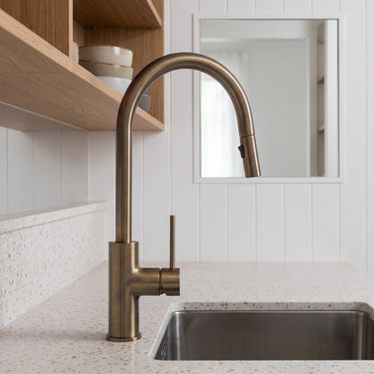 Porto Pull-Out Kitchen Mixer in Antique Brass in a kitchen