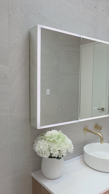Video demonstration of the exterior lighting of frameless LED bathroom mirror cabinet by Invogue