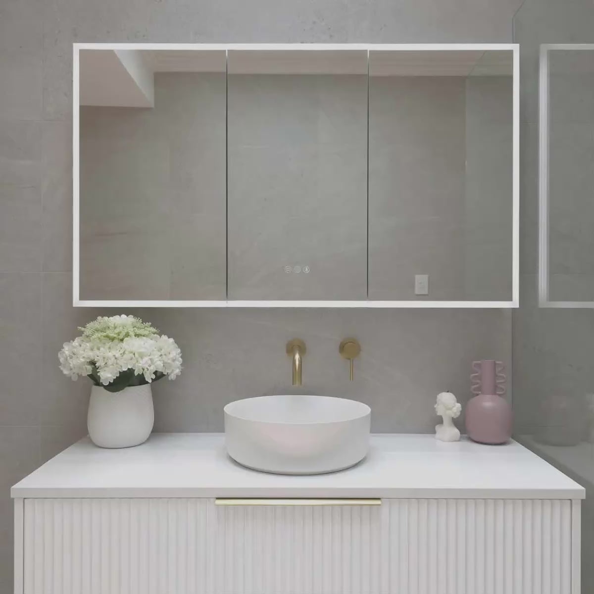 Video demonstration of three door frameless LED bathroom mirror cabinet