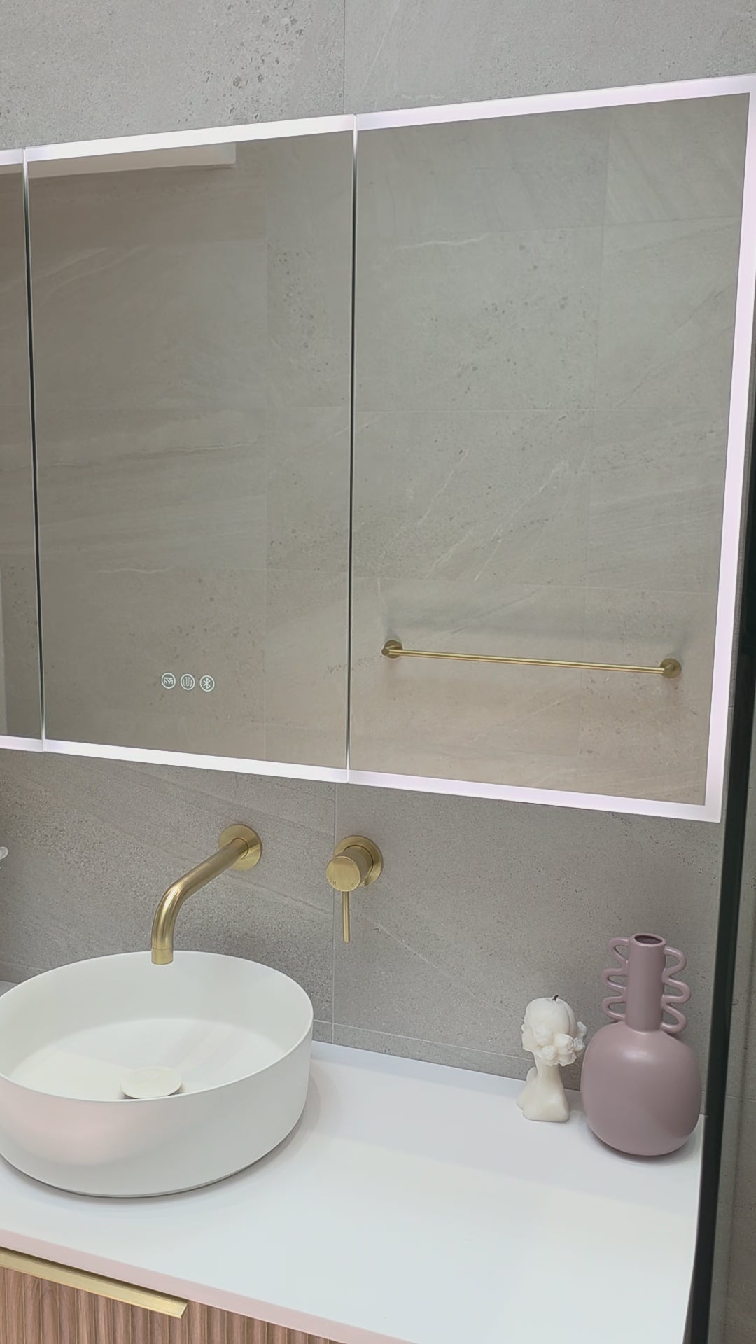 Video demonstration of frameless LED bathroom mirror cabinet exterior side angle by Invogue