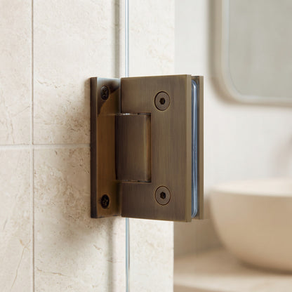 Close-up of the Rennes Shower Hinge Glass to Wall in Antique Brass