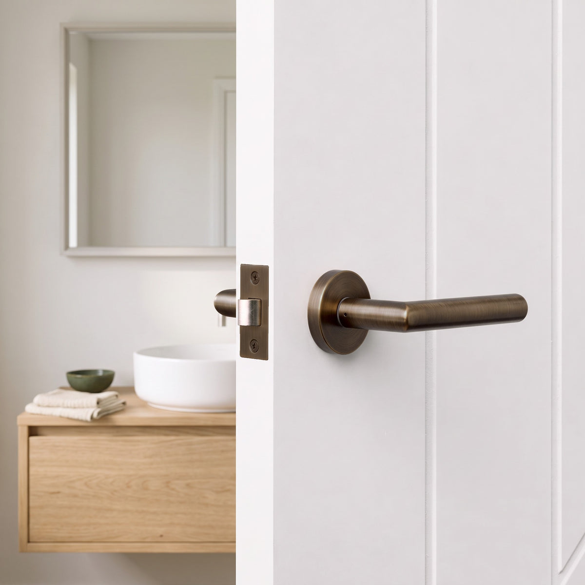 Close-up of the Santorini Door Handle in Antique Brass