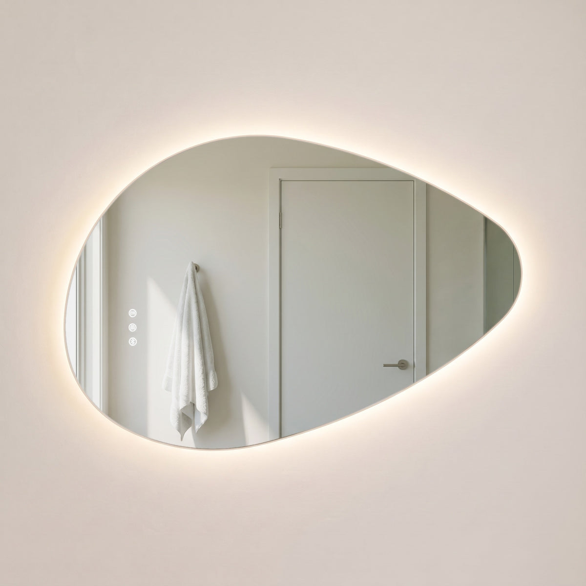 The Sorrento frameless backlit LED mirror, 800 x 550mm, three-quarter view floating off a warm-white wall with an even halo