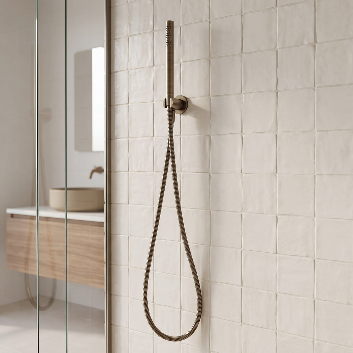 Versailles Handheld Shower Head with Hose in Antique Brass in a shower
