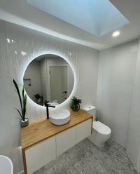 Amalfi LED Mirror Brightening White-Themed Bathroom with Glossy Tiles