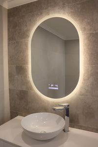 Cozy, intimate bathroom ambiance with soft yellow LED glow