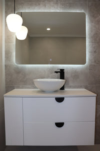 Inviting Vanity Space in White and Greyish Brown Bathroom with frameless Backlit LED Mirror