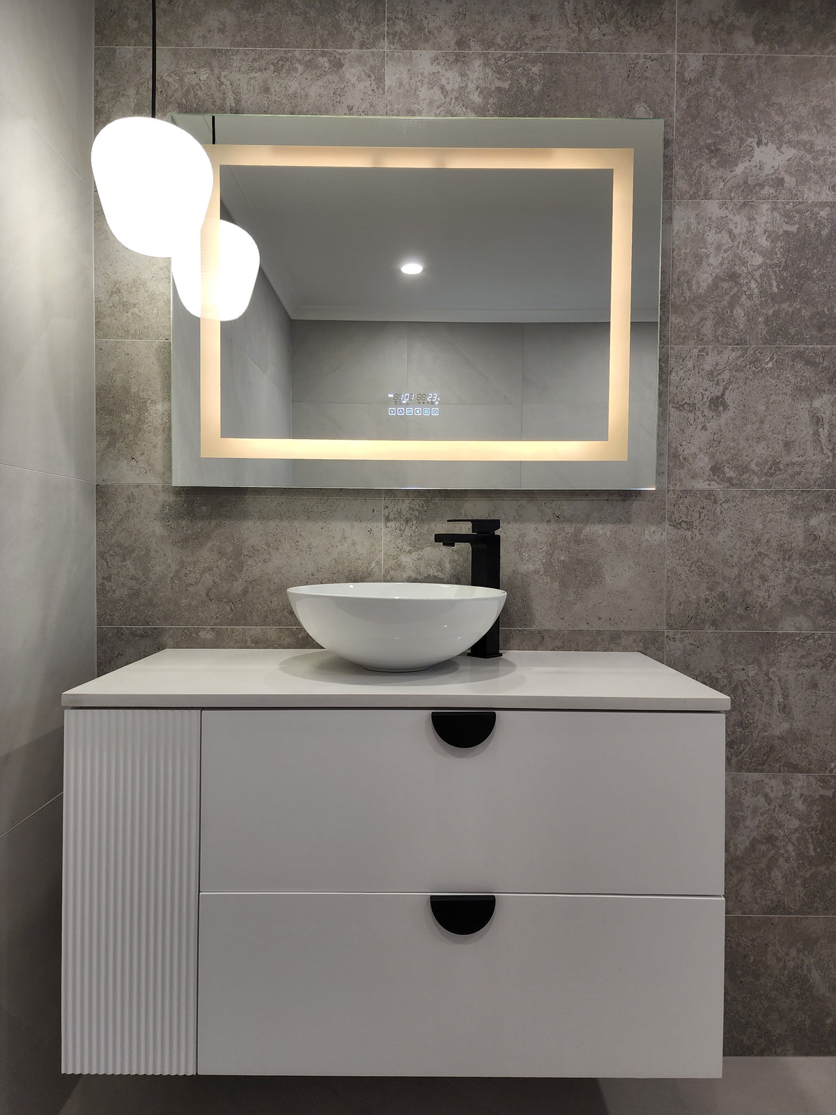 Modern Vanity Area with Rectangle Smart LED Mirror in Doorway View of Dirty Greyish Brown Bathroom