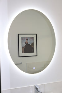 Portofino LED Backlit Mirror in Sleek White Washroom