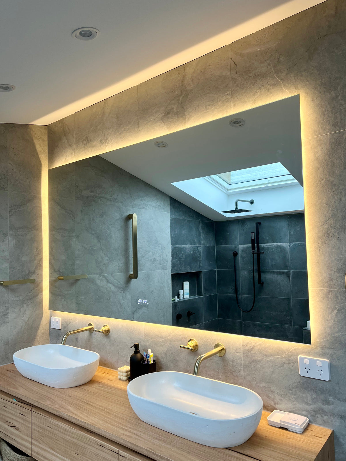 Relaxing Bathroom Ambience with Large LED Mirror on Yellow Light
